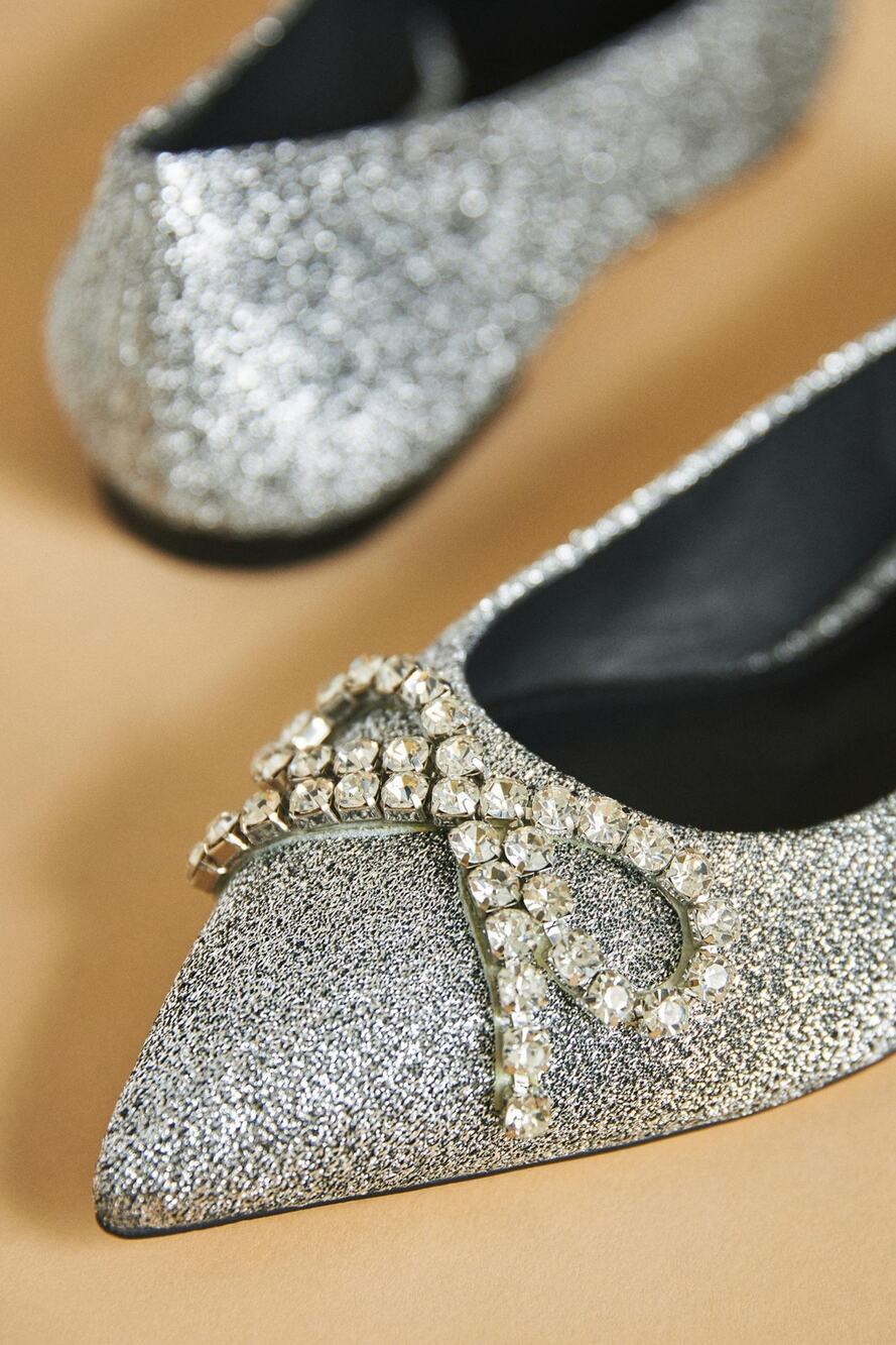 LARROUDE Anthropologie "Lee" Flat Silver with Crystal Bow Size 8